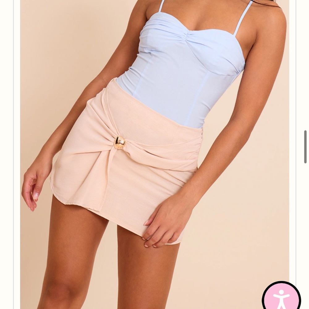 PrettyLittleThing Cream Mini Skirt with Gold Accent